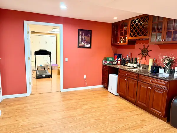 Basement wet bar with granite counter
