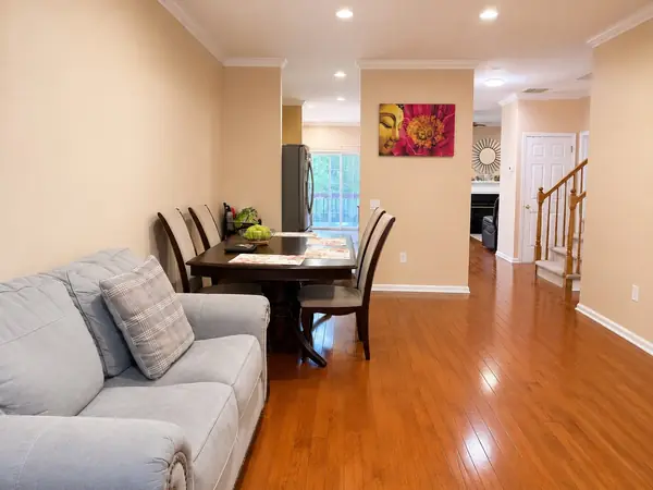 Living and dining combination with crown molding